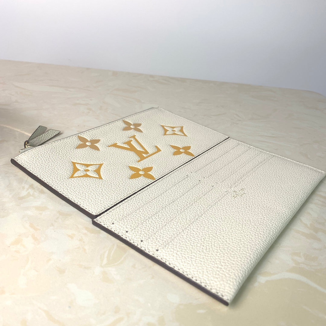 Louis Vuitton Monogram Empreinte Pochette 21cm White